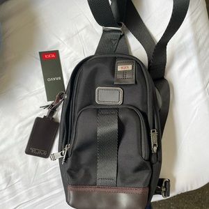 Tumi slim fife sling bag BNWT